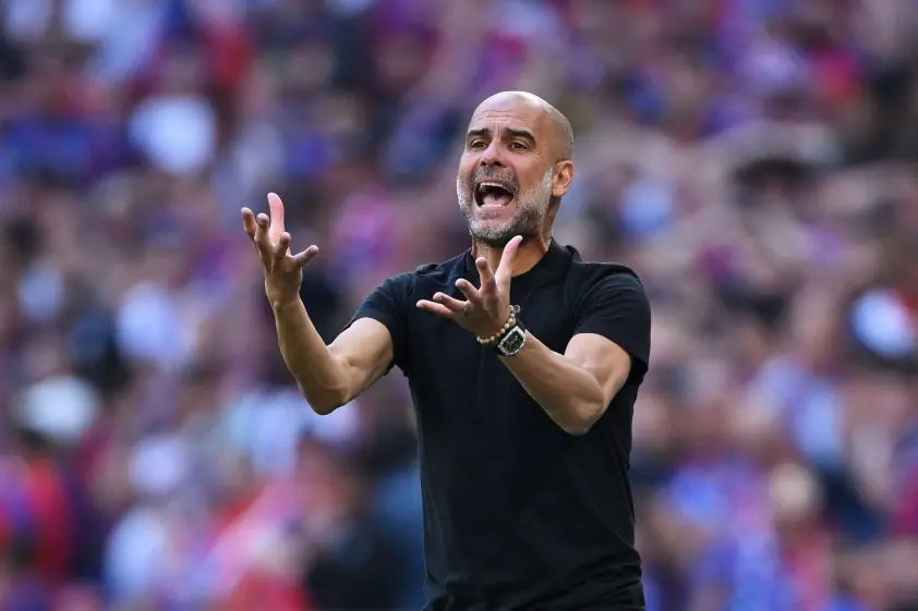 pep guardiola bat man man city 682d1dce8ff10